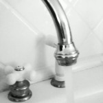 Washing your fruits and veggies under running tap water is the method the FDA recommends.
